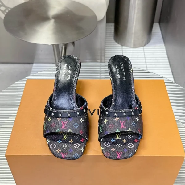 Mules Louis Vuitton coloris noir à motif cuir – pour femme — réplique