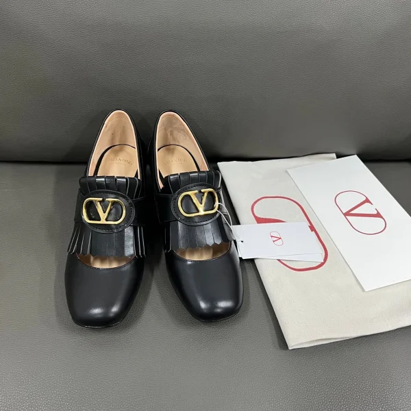 Mocassins Valentino coloris noir cuir franges – pour femme — réplique