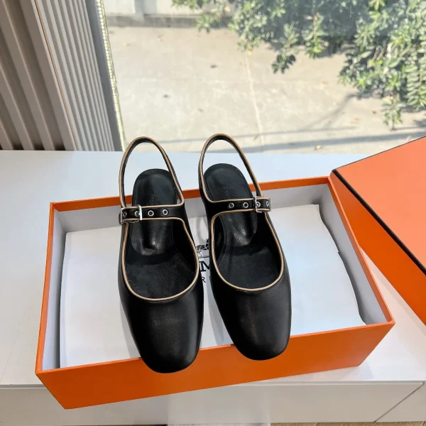 Mules Hermès coloris noir cuir à bride arrière – pour femme — réplique