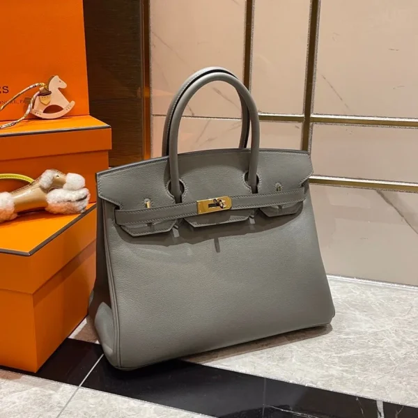 Modèle HN 30 CM coloris gris SWIFT cuir finitions dorées — réplique