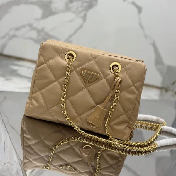 Sac vintage HOBO 25 en clair français coloris beige matelassé NYLON finitions dorées — réplique
