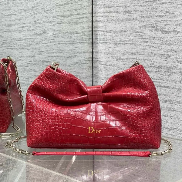 Sac Dior nœud petit format coloris rouge effet crocodile-embossé — réplique