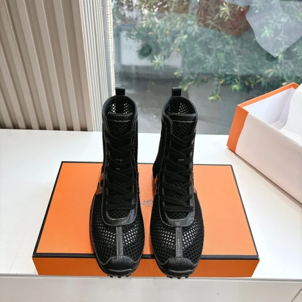 Bottes Hermès coloris noir résille et cuir – pour femme — réplique