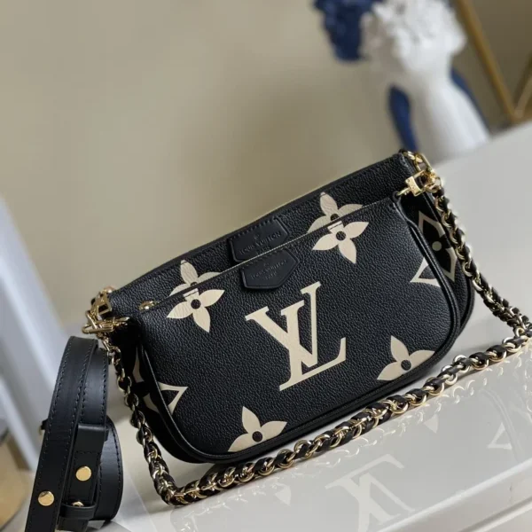 Pochette Louis Vuitton coloris bicolore Monogram Empreinte Multi Pochette — réplique