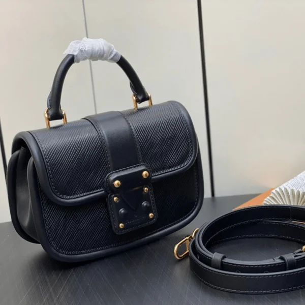 Sac à main Louis Vuitton peau et Seek coloris noir 21 × 15 × 8 cm – pour femme — réplique