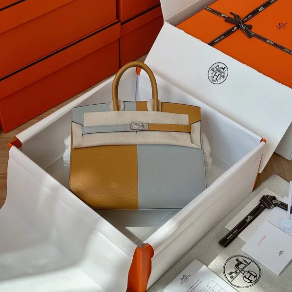 Modèle HN 25 coloris gris/coloris marron Epsom cuir finitions palladiées — réplique