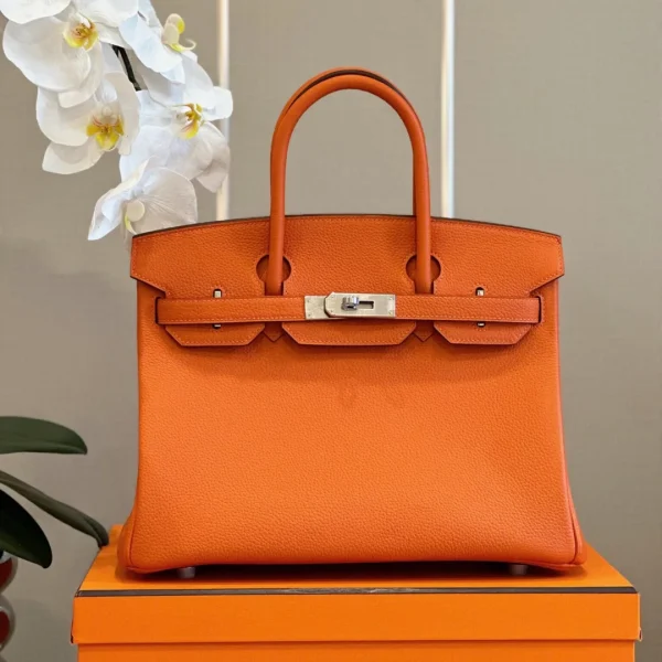 Modèle HN 30 coloris orange finitions palladiées — réplique