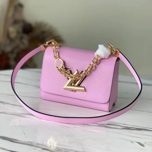 Sac à main Louis Vuitton Twist coloris rose avec fermoir doré 24 cm — réplique