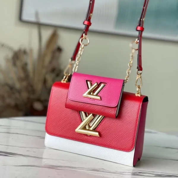 Sac à main Louis Vuitton Twist mélange coloris rose coloris rouge cuir de vache 24 cm — réplique