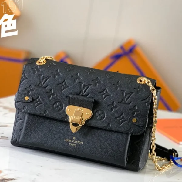 Sac à main Louis Vuitton Vavin Monogram coloris noir avec fermoir doré 25 × 18 × 10 cm — réplique