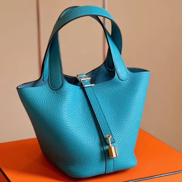 Modèle HN 18 coloris bleu Togo cuir finitions dorées — réplique