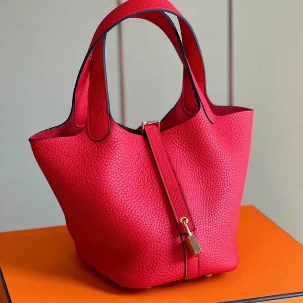 Modèle HN 18 coloris rose Togo cuir finitions dorées — réplique