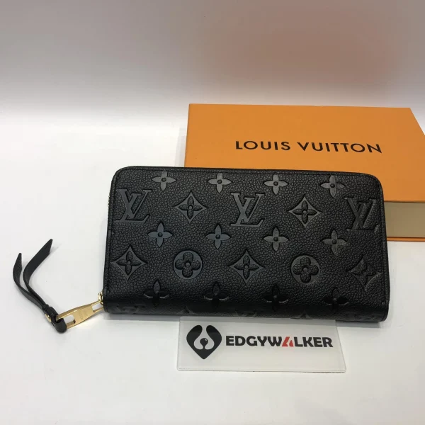 Portefeuille Louis Vuitton fermeture zippée coloris noir — réplique