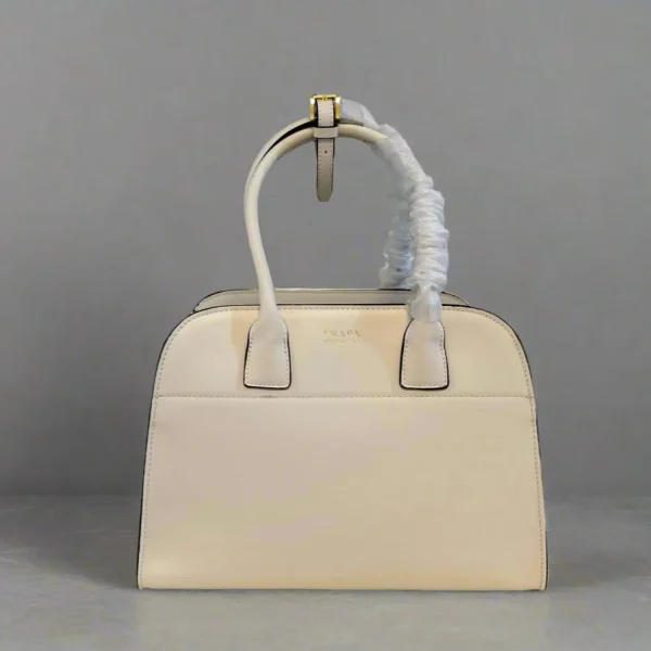 Sac format moyen GALLERIA 28 en CIDER coloris marron lisse cuir de veau finitions dorées — réplique