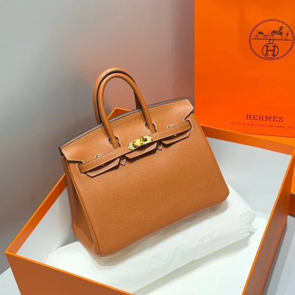 Modèle HN 25 en BURNT coloris orange cuir de veau finitions dorées — réplique