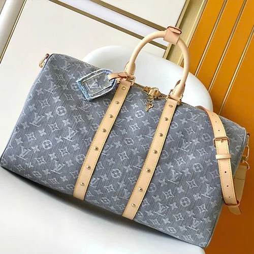 Modèle Louis Vuitton Keepall denim bandouliere 55 coloris gris — réplique