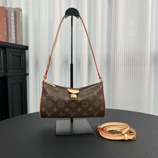 Pochette Louis Vuitton Tirette en Monogram toile — réplique