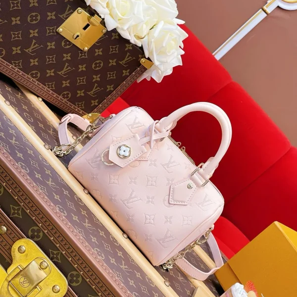Modèle Louis Vuitton Speedy 20 en coloris rose Monogram Empreinte — réplique