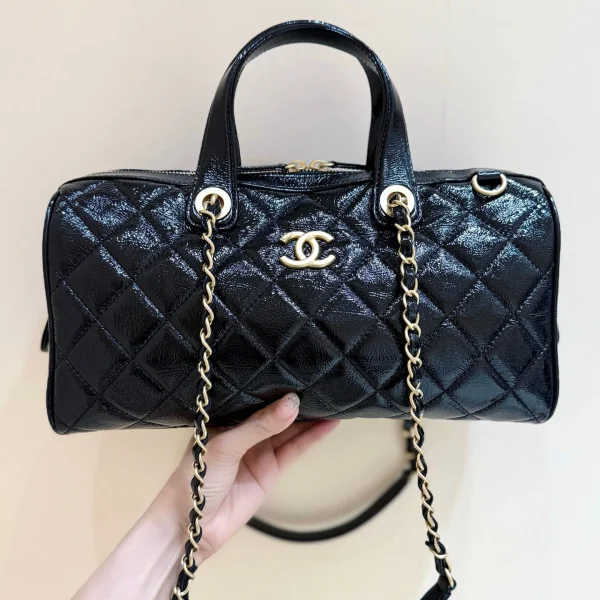 Sac Chanel 25K Bowling en coloris noir cuir grain caviar finitions dorées — réplique