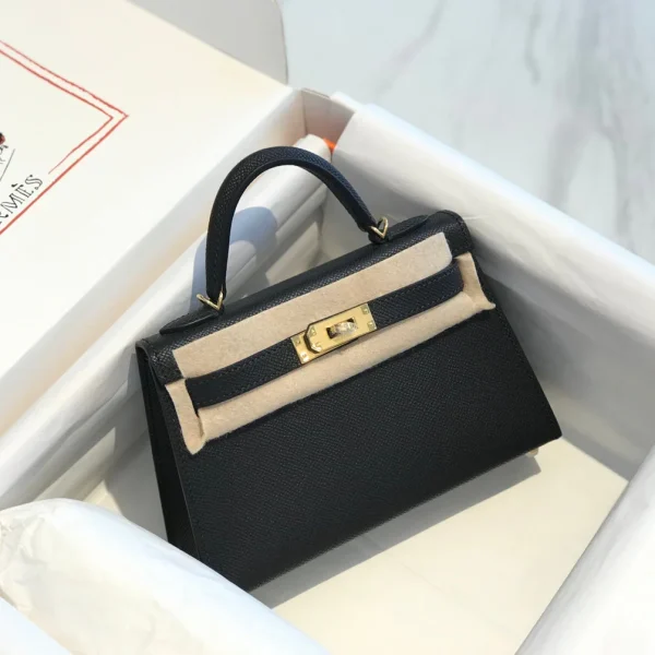 Modèle HN mini 20 coloris noir finitions dorées — réplique